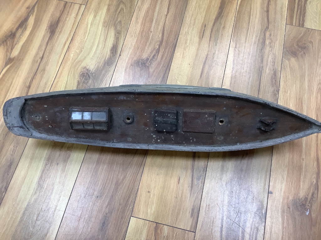 A painted model of a boat, length 76cm